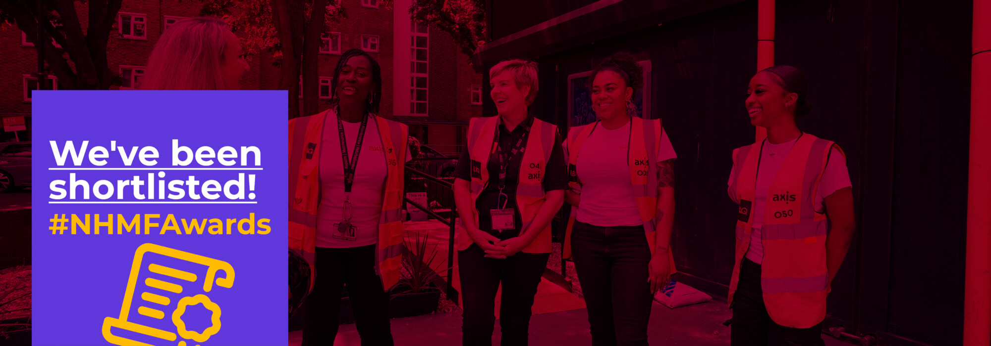 Red transparent background with a group of smiling ladies outside wearing Axis jackets. Purple box with white text: We've been shortlisted and #NHMFawards with a yellow icon