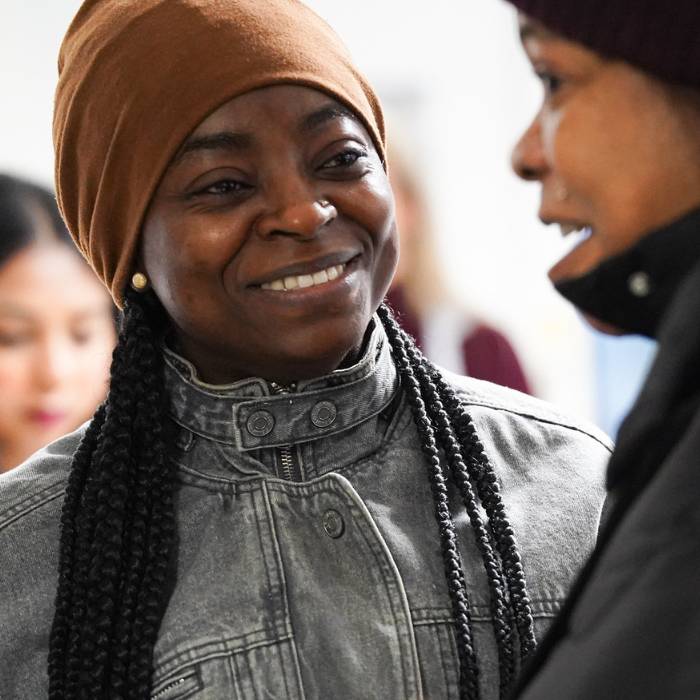 Smiling lady with hat and top