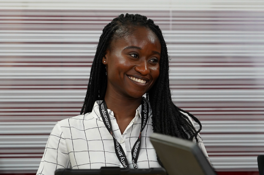 Ethnic woman smiling in an office